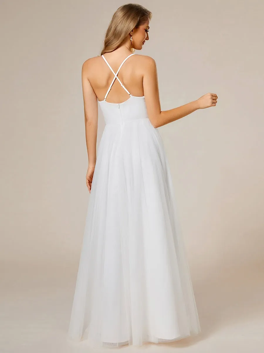 Whisper ivory soft knit and tulle cross back wedding dress and top